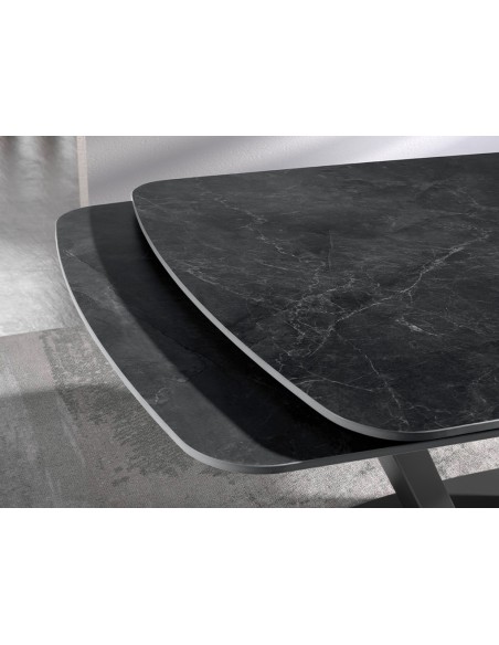 Mesa comedor extensible ovalada barril mármol porcelánico y acero negro