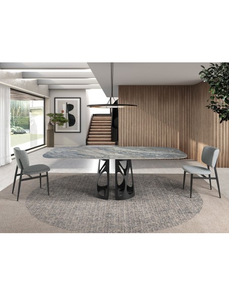 Mesa comedor ovalada barril mármol porcelánico y acero negro
