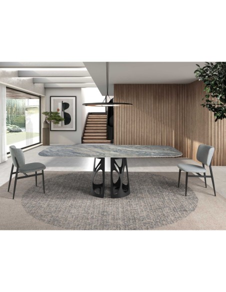 Mesa comedor ovalada barril mármol porcelánico y acero negro