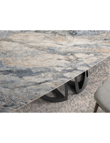 Mesa comedor ovalada barril mármol porcelánico y acero negro