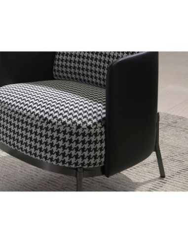 Sillón tela blanca y negra y polipiel negro
