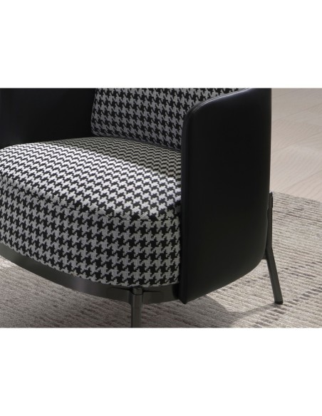 Sillón tela blanca y negra y polipiel negro