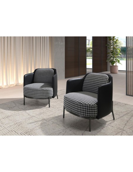 Sillón tela blanca y negra y polipiel negro