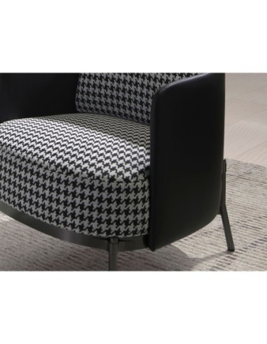 Sillón tela blanca y negra y polipiel negro