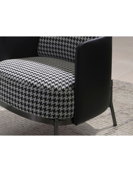Sillón tela blanca y negra y polipiel negro